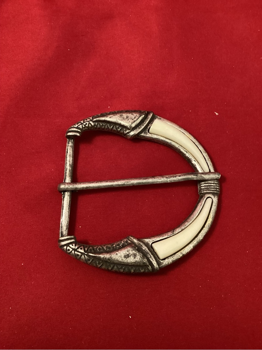 Large silver tone buckle with cream inlay